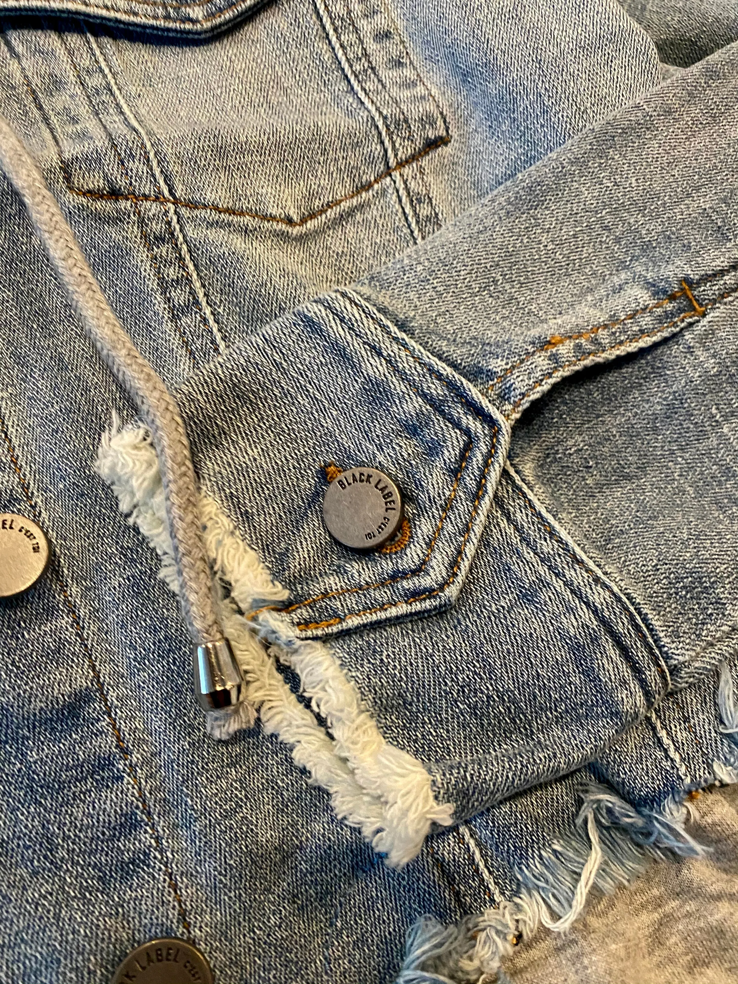 Distressed Denim Jacket with Terry patch